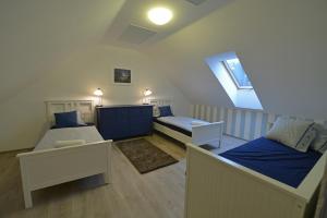 Postel nebo postele na pokoji v ubytování Apartmány Belveder