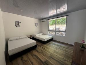 Llit o llits en una habitació de Kulcana - Cerros del Guacaná 17 fotos més