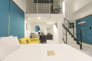 Postel nebo postele na pokoji v ubytování Arentz Hotel