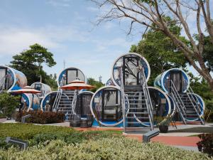 a group of slides in a park at Cocoons Club Laiya in Batangas City