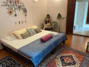 Voodi või voodid majutusasutuse Casa Mar de Marias Spa Holistico toas