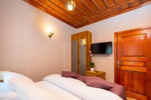 TV a/nebo společenská místnost v ubytování Wonder Wood Hotel