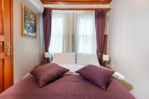 Postel nebo postele na pokoji v ubytování Wonder Wood Hotel