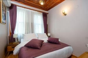 Postel nebo postele na pokoji v ubytování Wonder Wood Hotel