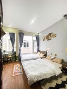 Postel nebo postele na pokoji v ubytování Little Chái Nho Homestay