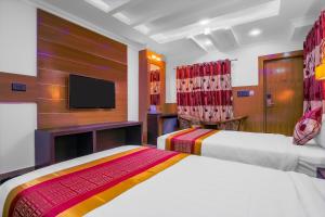 Postel nebo postele na pokoji v ubytování Hotel Intourist Palace