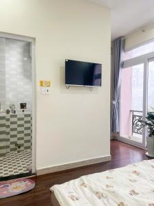 TV a/nebo společenská místnost v ubytování Little Chái Nho Homestay + 34 fotografií