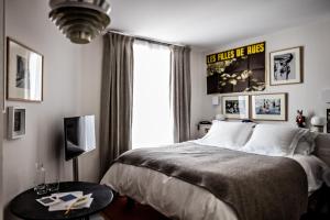 Postel nebo postele na pokoji v ubytování Le Pigalle, a Member of Design Hotels