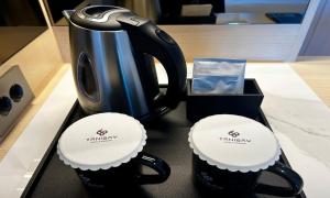 Příslušenství pro přípravu čaje a kávy v ubytování Ulsan Tanibay Hotel & Wedding