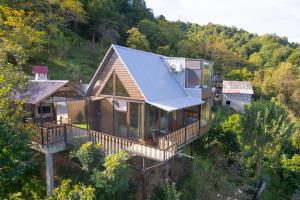 an overhead view of a house with a metal roof at chemi kera Chalet in Makho