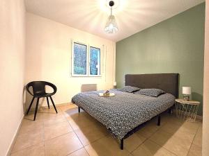 Voodi või voodid majutusasutuse Le Parc Jean Édouard - Spa avec jacuzzi privé - Superbe villa 4 chambres - 9 couchages - 6 lits - Poêle - Parking - Climatisation réversible- Terrasse ombragée et grand jardin toas