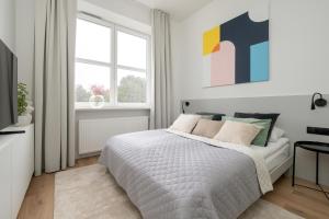 Posteľ alebo postele v izbe v ubytovaní Gagarina Warszawa Przytulne Studio by Noclegi Renters + 12 fotografií