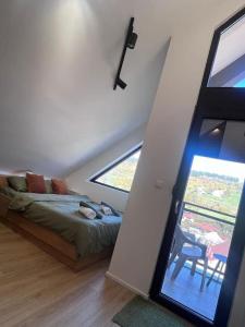 Voodi või voodid majutusasutuse Pine View toas