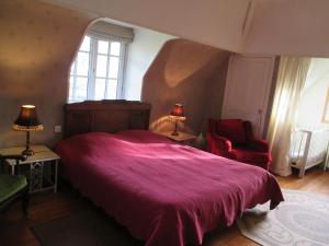 Postel nebo postele na pokoji v ubytování Moulin du Hamelet