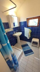 Kúpeľňa v ubytovaní Fenyves Villa + 20 fotografií