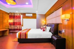 Postel nebo postele na pokoji v ubytování Hotel Intourist Palace