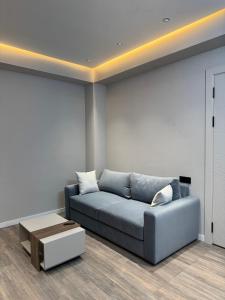 Χώρος καθιστικού στο Firdavsi Building Center 4Rest Apartments
