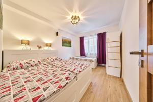 Postel nebo postele na pokoji v ubytování Apartmán - Dovolená Žacléř