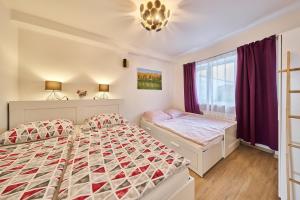 Postel nebo postele na pokoji v ubytování Apartmán - Dovolená Žacléř