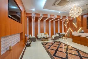 TV a/nebo společenská místnost v ubytování Park Avenue Hotel & Apartments Trichy