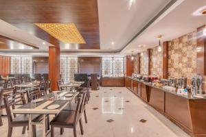 Restaurace v ubytování Park Avenue Hotel & Apartments Trichy