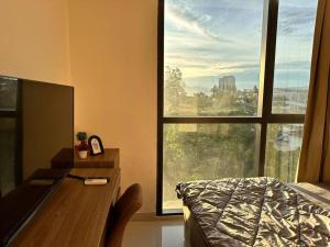 Ένα ή περισσότερα κρεβάτια σε δωμάτιο στο Free Wifi, Infinity Pool, Kuching Kozi Square i -GHG