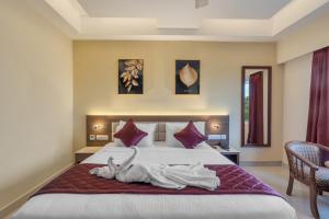 Postel nebo postele na pokoji v ubytování Park Avenue Hotel & Apartments Trichy