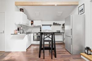 Kuchyň nebo kuchyňský kout v ubytování Kinna Central Town Villa + 28 fotografií