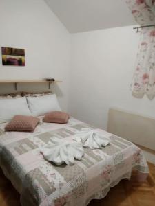 Postel nebo postele na pokoji v ubytování Alex Apartment