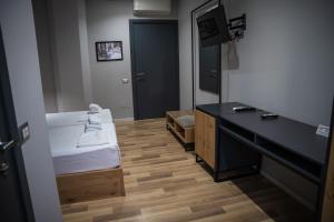 Postel nebo postele na pokoji v ubytování Center Boutique Hotel