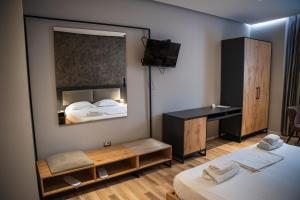 Postel nebo postele na pokoji v ubytování Center Boutique Hotel