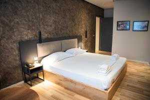 Postel nebo postele na pokoji v ubytování Center Boutique Hotel