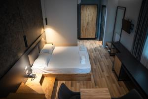 Postel nebo postele na pokoji v ubytování Center Boutique Hotel