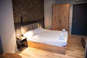 Postel nebo postele na pokoji v ubytování Center Boutique Hotel