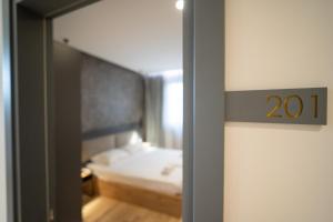Postel nebo postele na pokoji v ubytování Center Boutique Hotel