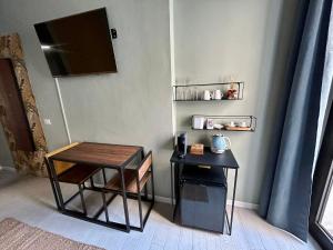 TV a/nebo společenská místnost v ubytování RO-MI Room