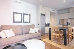 Kuchyň nebo kuchyňský kout v ubytování Uma Suites Barceloneta Beach