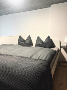 Ένα ή περισσότερα κρεβάτια σε δωμάτιο στο X-Loft Erfurt