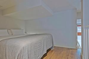 Postel nebo postele na pokoji v ubytování Uma Suites Barceloneta Beach