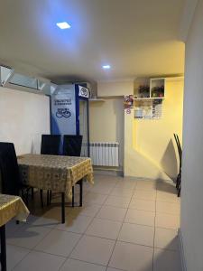 Posezení v ubytování Guest House + 6 fotografií