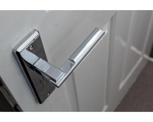 a metal towel rack on a wall at Uno Hotel Heathrow Windsor in Slough
