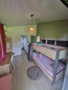 Postel nebo postele na pokoji v ubytování Léana Home à TAUTIRA