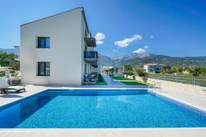 Πισίνα στο ή κοντά στο Kataleya Poolside Suites