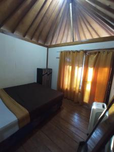 Postel nebo postele na pokoji v ubytování Lombok Collection Gili Air