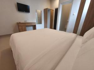Ein Bett oder Betten in einem Zimmer der Unterkunft Lushy Hostel Nusa Penida