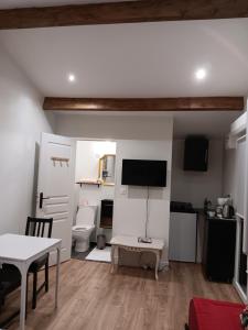 Kuchyň nebo kuchyňský kout v ubytování studio maisonette