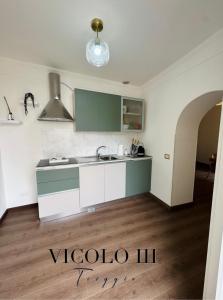 Kuchyň nebo kuchyňský kout v ubytování Vicolo III Triggio