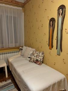 Łóżko lub łóżka w pokoju w obiekcie Apartament u Maliny