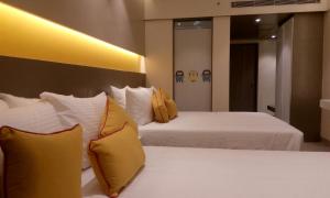 Postel nebo postele na pokoji v ubytování ZIBE Coimbatore by GRT Hotels