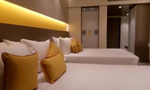 Postel nebo postele na pokoji v ubytování ZIBE Coimbatore by GRT Hotels